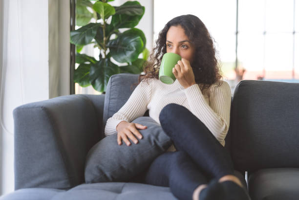istock woman stay at home. 1348937720