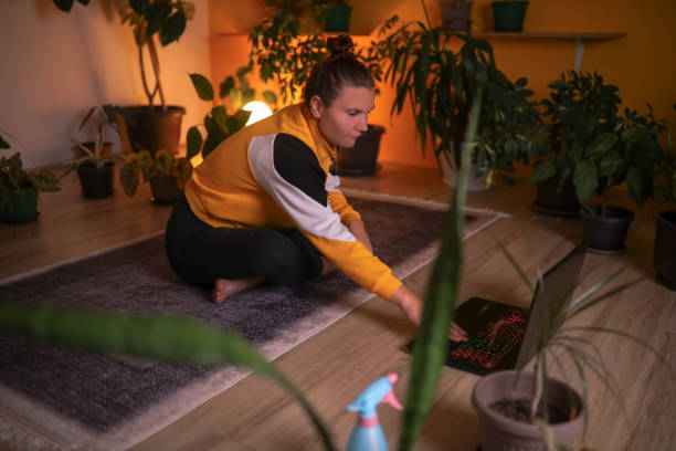 istock Checking the internet how to exercise at home 1348938614