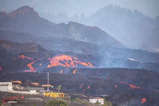 Lava flow destroying residential houses in La Palma volcanic Eruption. Tajuya. 10/18/2021
