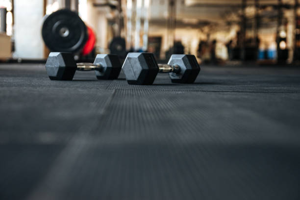 istock Dumbbells on the floor in gym 1348941761