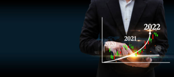 istock businessman using digital mobile tablet with graphic candle stick population chart hologram on dark background, population community growth, stock market, investment and financial business concept 1348942635