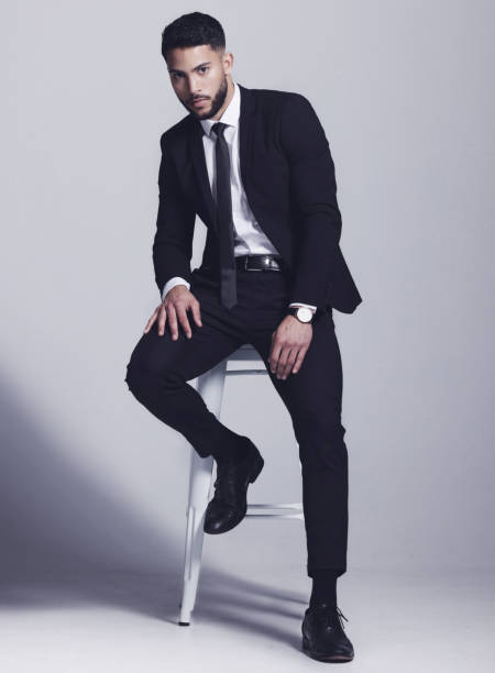 istock Studio shot of a young man posing against a grey background 1348944258