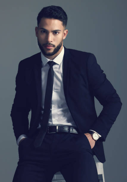 istock Studio shot of a young man posing against a grey background 1348944265