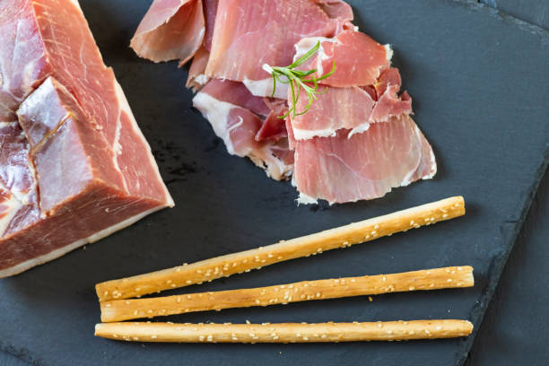 istock Italian ham served with grissini 1348953496