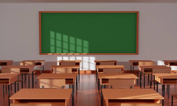 istock table and chairs with green board on the white wall in the classroom.3d rendering. 1348953639