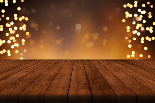 istock Christmas background with bokeh effects for product placement 1348954384