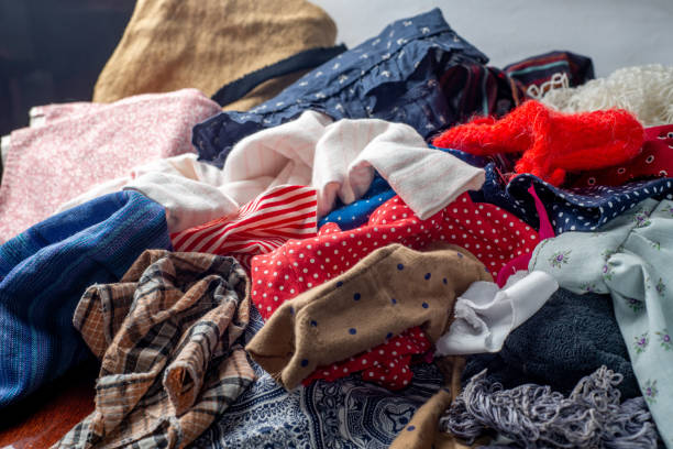 istock pile of used clothes. Second hand for recycling 1348954825