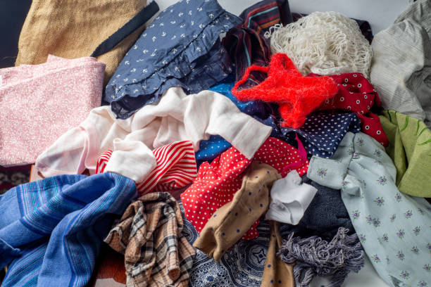istock pile of used clothes. Second hand for recycling 1348954844