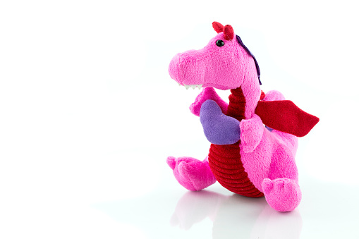 Dinosaur plush doll isolated on white background