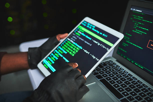 istock Shot of an unrecognizable IT technician  in a server room and using a laptop 1348966837