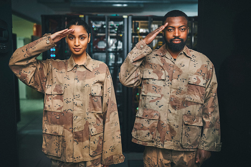 Teamwork, security and arms crossed with portrait of soldier for military service, veteran and mission planning. Intelligence, strategy, surveillance and warrior with people in control room for hero