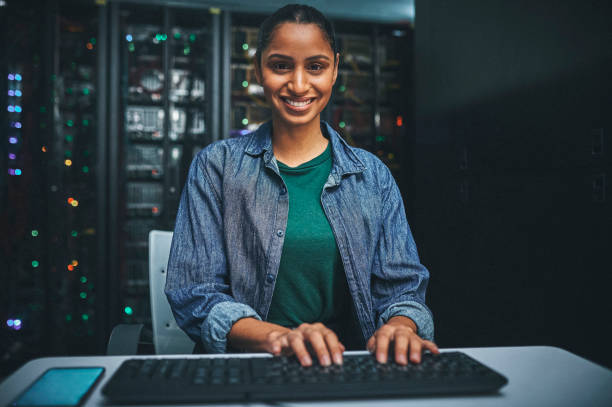 istock Shot of an female IT technician in a server room and using a laptop 1348968803