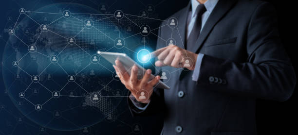 istock Businessman holder using tablet with touching global on social internet, digital network technology and data customer connection. 1348969789