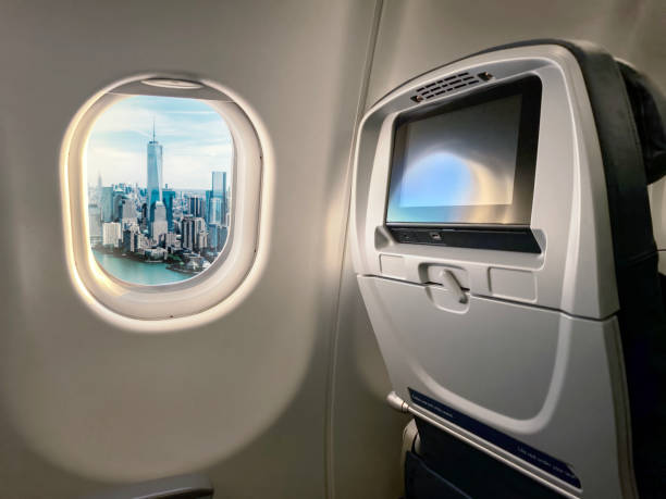 istock Airplane seat with New York view 1348970366