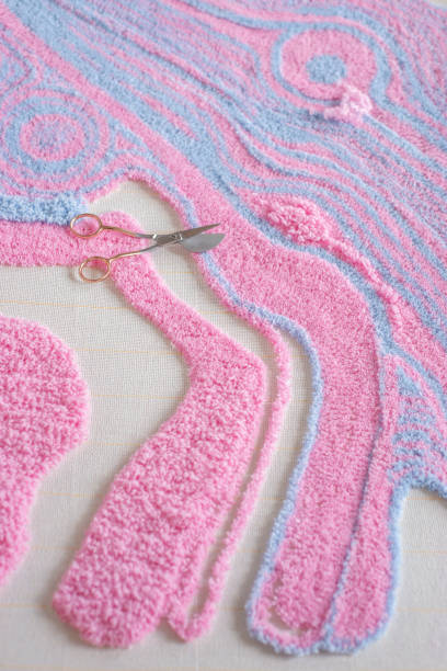 istock Making a wall rug by hand.  Art of manual tufting. 1348972730