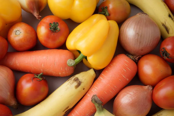 variety red, yellow colored vegetables, fruits flat lay, knolling. for organic, prebiotics, reducing estrogen dominance, keto, paleo food, immune boosting, world food day with plant based sources. - carotene imagens e fotografias de stock