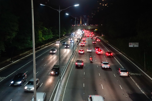 freeway in Sao Paulo city at night, car traffic and lights.