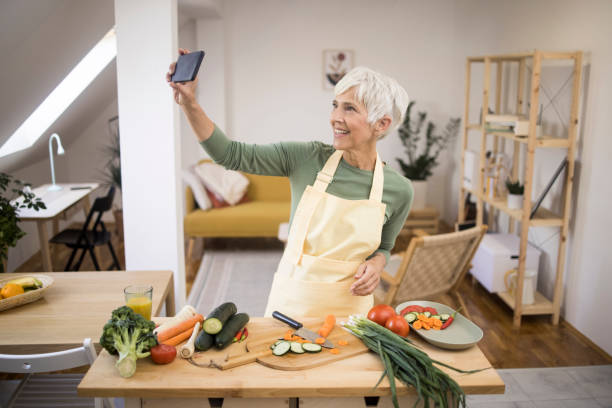 istock Woman taking selfie in kitchen 1348976818