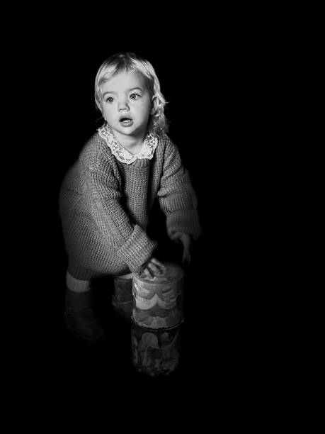 istock Cute playing baby girl 1348976828