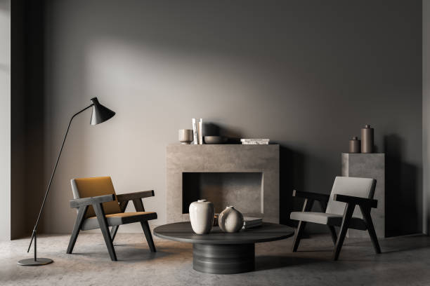 istock Dark grey living room seating with empty wall 1348981417