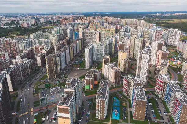 Aerial drone view of Kudrovo city skyline panorama, Saint-Petersburg outskirts, Leningrad oblast, Vsevolozhsky District high density living suburbia, high rise district, Dybenko station, Russia"n
