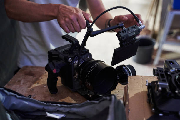 istock professional video camera in the hands of the operator. professional removable for professional video equipment 1348982218
