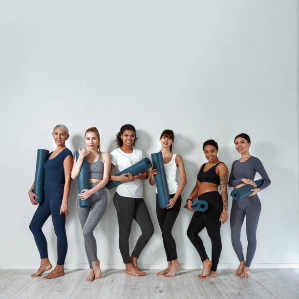 Portrait of diverse woman group in sportswear before training stock photo