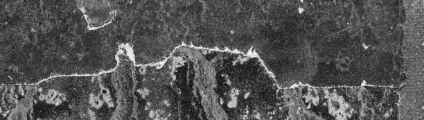 istock close-up black and white paper texture background 1348988286