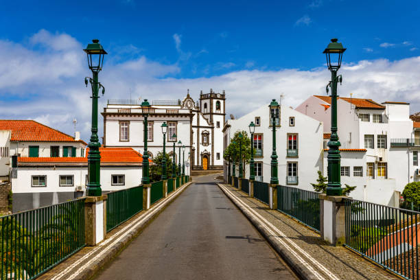 View of Nordeste on Sao Miguel Island, Azores. Old stone arch bridge in Nordeste village, Sao Miguel, Azores. Nordeste village with white town buildings on the island of Sao Miguel, Azores, Portugal. View of Nordeste on Sao Miguel Island, Azores. Old stone arch bridge in Nordeste village, Sao Miguel, Azores. Nordeste village with white town buildings on the island of Sao Miguel, Azores, Portugal. san miguel portugal stock pictures, royalty-free photos & images