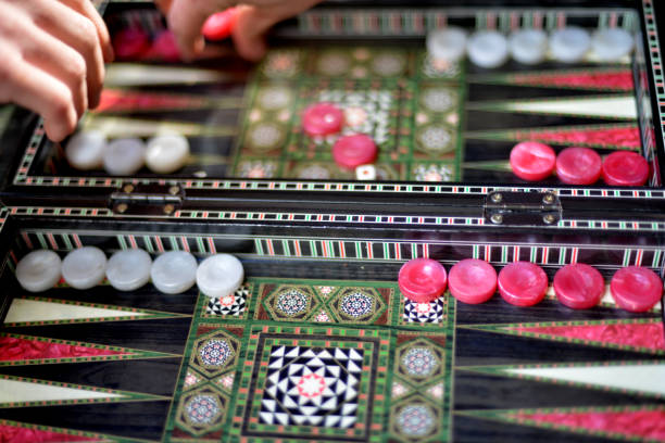 istock Backgammon on the wooden box, dice and chips for the game. 1348993155