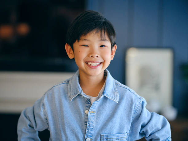 istock Natural Light Portrait of an Asian Boy 1348996576