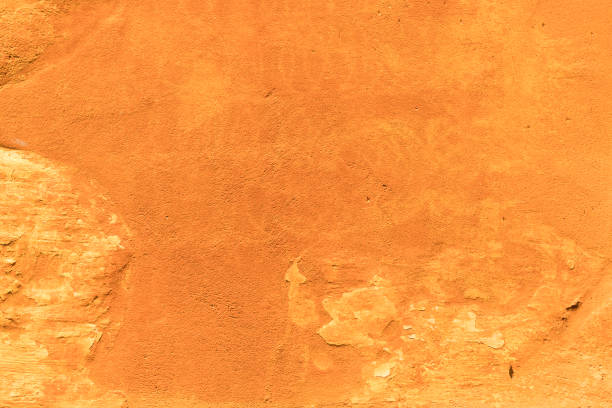 fundo de parede texturizado laranja - orange wall textured paint - fotografias e filmes do acervo