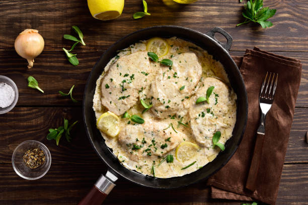 istock Chicken breast in creamy garlic sauce 1349006615