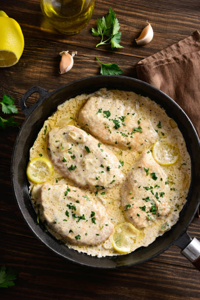istock Chicken breast in creamy garlic sauce 1349006643
