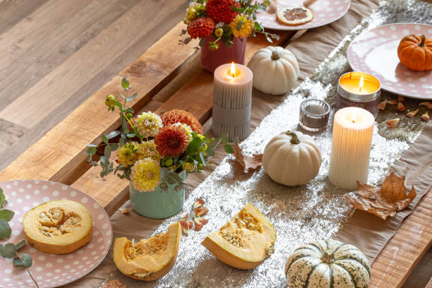 istock Festive table setting with pumpkins and chrysanthemum flowers. 1349008619