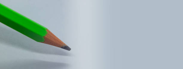 istock Pencil on a blank white paper web banner 1349010589