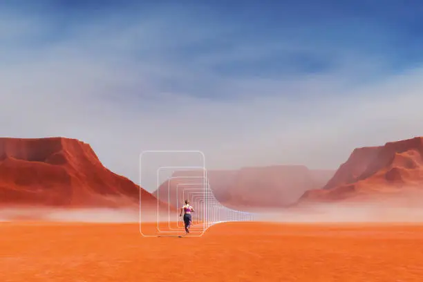 Photo of Abstract image of woman running in barren desert