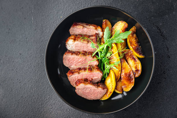 istock duck breast second course fresh ready to eat meal snack on the table copy space food background rustic 1349012502