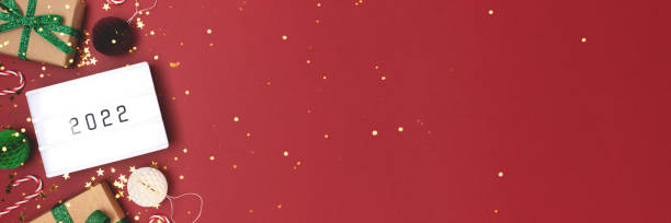 istock Lightbox with 2022 numbers. Banner with New Year decorations. 1349019981