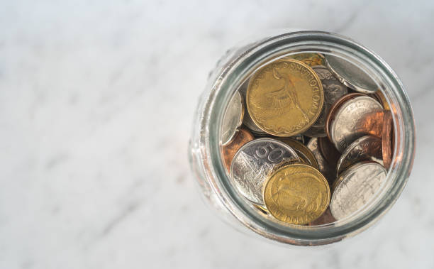 istock Conceptual Savings Full Jar from Above 1349020833