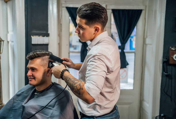 istock Young man getting new haircut 1349021726