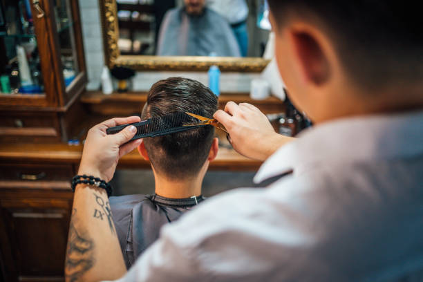 istock Barber giving a haircut 1349021873