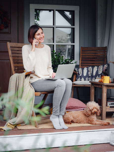 istock female studying at home with laptop. 1349021894