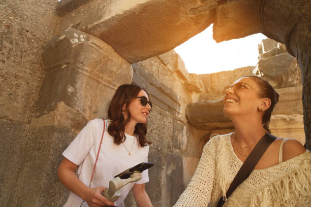 istock two women while exploring among the old buildings in the ancient city 1349024285