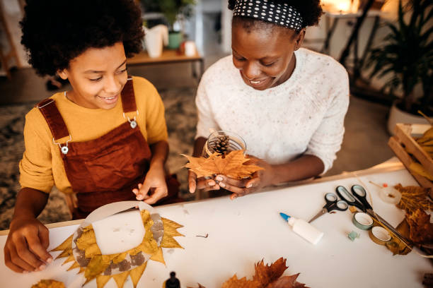 istock Family doing autumn decor 1349028072