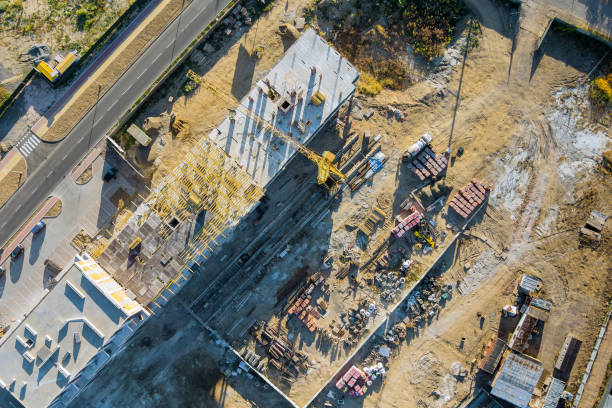 istock Construction cranes unfinished residential buildings on housing construction, apartment 1349030496