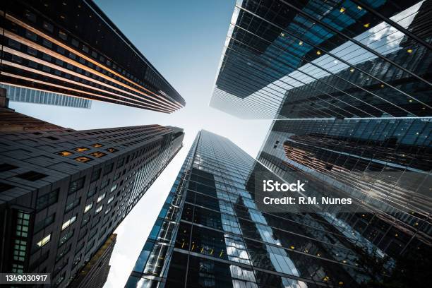 Business And Finance Looking Up At High Rise Office Buildings In The Financial District Of A Modern Metropolis Stock Photo - Download Image Now