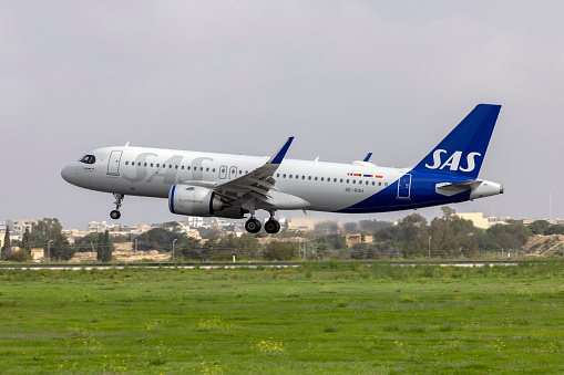 Luqa, Malta - October 24, 2021: Scandinavian Airlines - SAS Airbus A320-251N (REG: SE-ROH) with an updated colour scheme on finals runway 31.