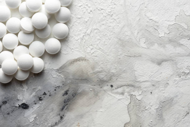 istock A handful of pills scattered on the table 1349039609
