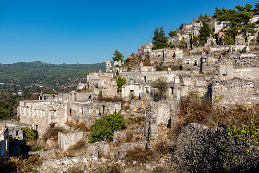 Ancient old fortress. Mukhrani Ksani Castle ruin in mountains, aerial drone view.